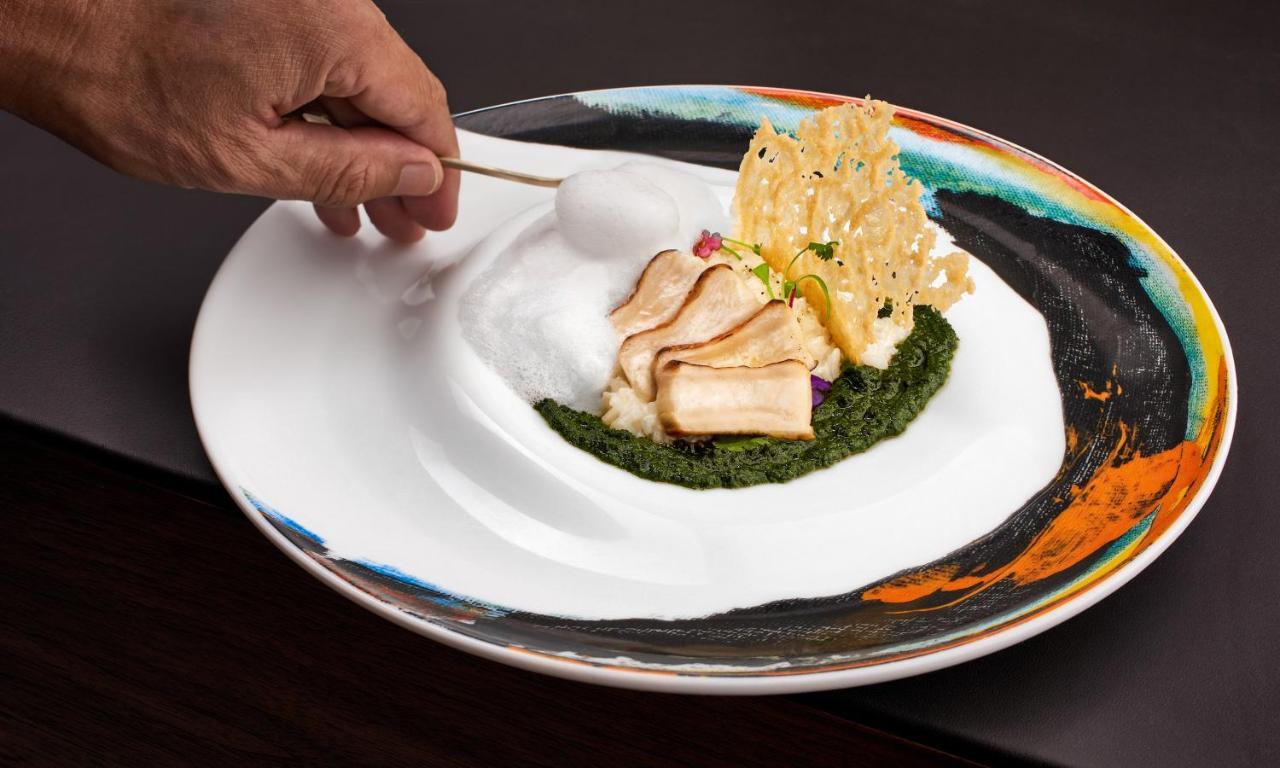 ette luxury hotel&spa Four Corners Extérieur photo A plate of food