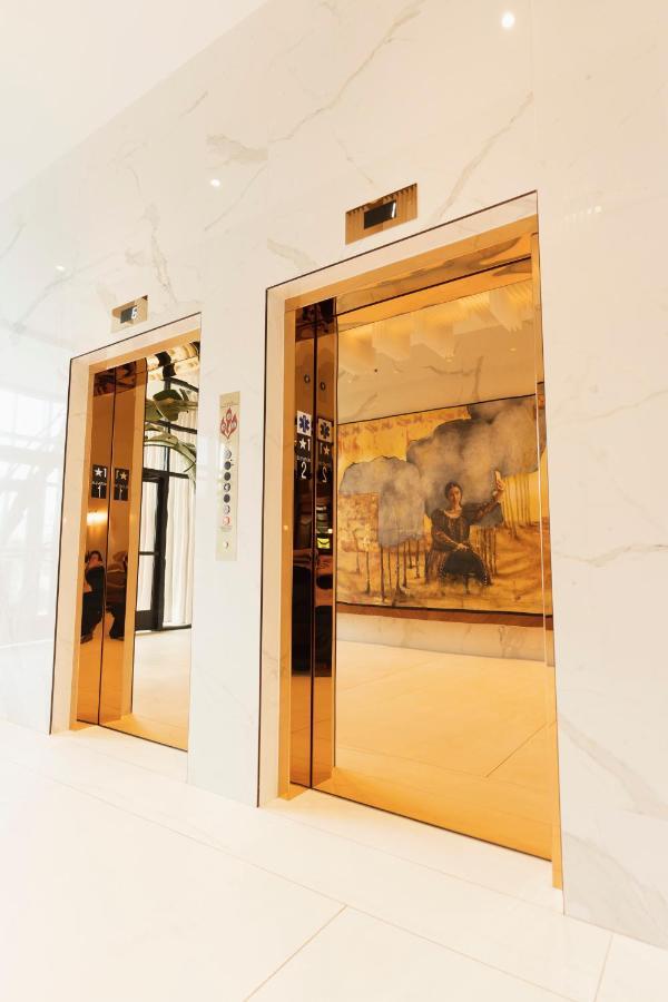 ette luxury hotel&spa Four Corners Extérieur photo The elevators at the Ritz-Carlton, Dubai